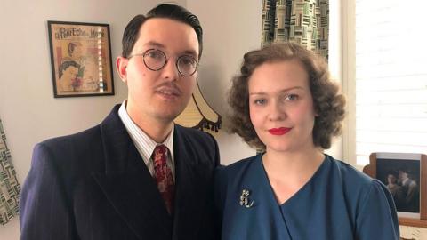 Greg Kirby and Liberty Avery dressed in the style of the 1940s