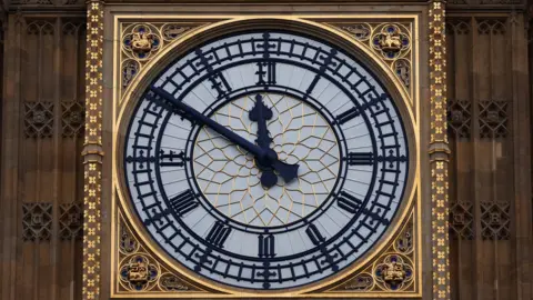 ANDY RAIN/EPA-EFE/REX/Shutterstock The black and gold clock face of Big Ben in London.