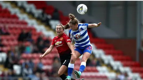 Getty Images Rachel Rowe (right) in action for Reading against Manchester United