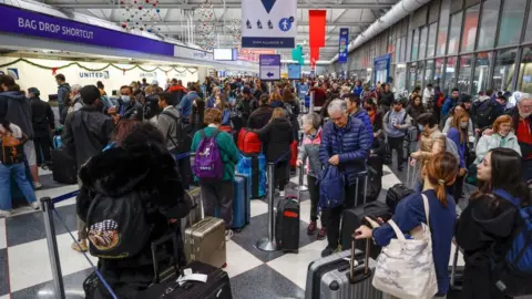 Getty Images Travellers at O'Hare Airport in Chicago