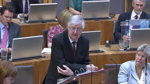 Senedd Cymru Mark Drakeford speaking in the Senedd