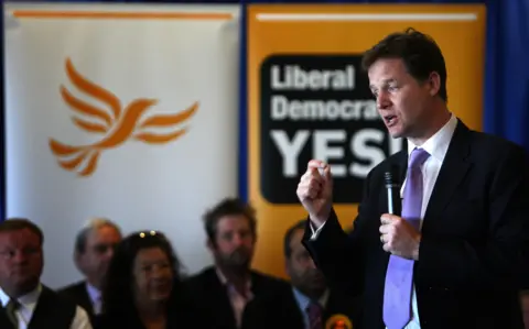 PA Media Nick Clegg answers questions during campaigns stop in Leicester for the for Yes campaign