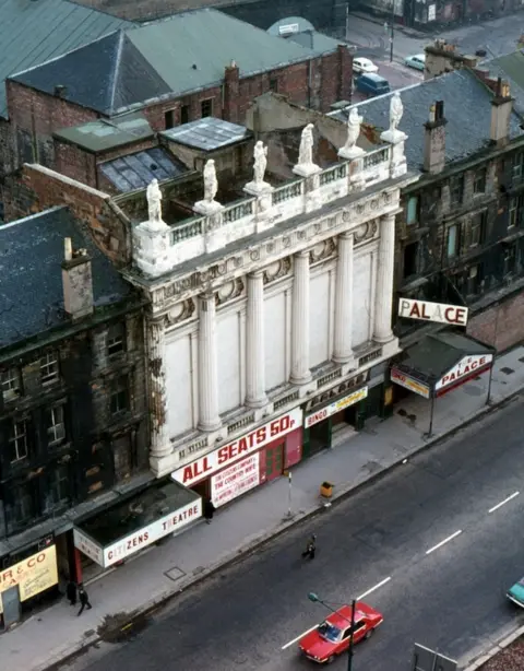 John Crallan Statues on roof showing the Citizen and Palace theatres