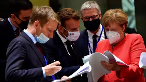 EPA Chancellor Merkel (R) at EU summit in Brussels, 20 Jul 20