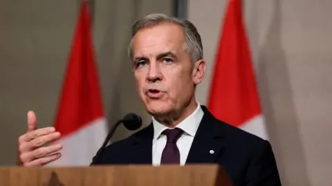 Reuters Canada's Prime Minister Mark Carney speaks during a press conference, on the sidelines of the 47th ASEAN Summit in Kuala Lumpur, Malaysia, October 27, 2025.
