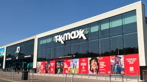 The TK Maxx store dominates the image, with a JD Sports store being on the left.