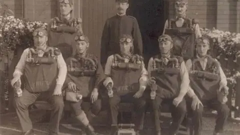 Wrexham Heritage Services Black and white photo of rescuers