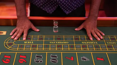From boom to ban, the rise and fall of India's betting apps 7 Reuters A casino dealer stands at a Roulette table inside a casino at City of Dreams, an integrated resort that includes Sri Lanka's first high end casino, in Colombo, Sri Lanka, August 25, 2025. REUTERS/Thilina Kaluthotage