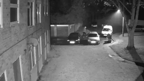 CCTV shows man walking and then running away