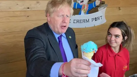 Boris Johnson serving ice cream