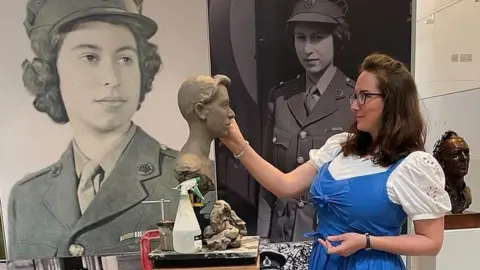 Keziah Burt Keziah Burt sculpting Queen portrait bust