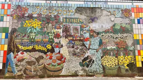 BBC Large chunks can be seen to be missing from Kenneth Budd's mural 