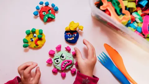 Getty Images Coronavirus models made by a child from playdough