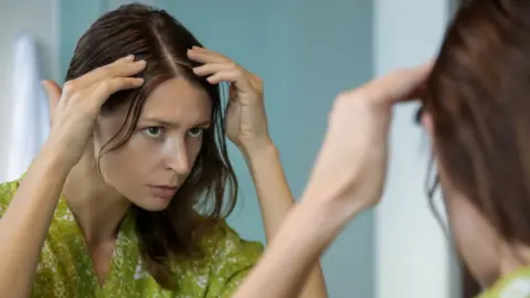Cause of grey hair may be 'stuck' cells, say scientists