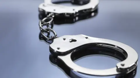 Handcuffs on desk