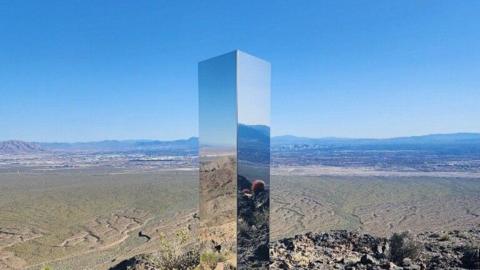 Photo of reflective monolith appearing in the Nevada Desert