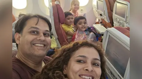  Dr Prateek Joshi his wife and three children on the plane