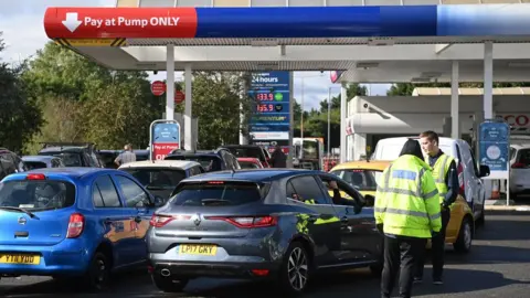 EPA Cars queue at a Tesco garage in Friern Barnet, London