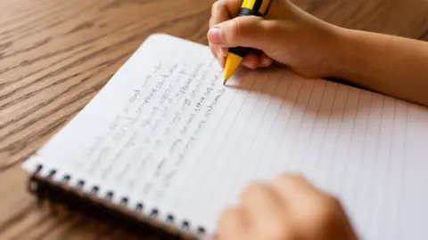 Bigandt_Photography Child writing