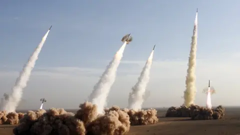AFP/Getty Iranian missiles launched during military manoeuvres