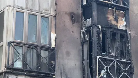 Badly damaged flats at Sandell Place, Amesbury