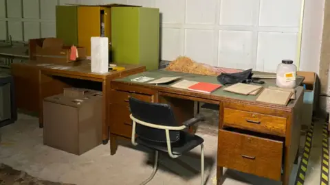 An image of a government desk inside Nottingham War Rooms