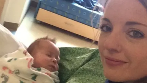 Aurora Police Department Officer Emily Hitchings and Axle