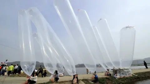 AFP / Getty Balloons being prepared in April 2012