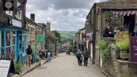 The cobbled Main Street of Haworth village 