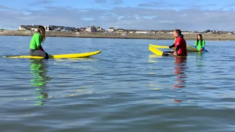 Ysgol y Deri Children paddleboarding