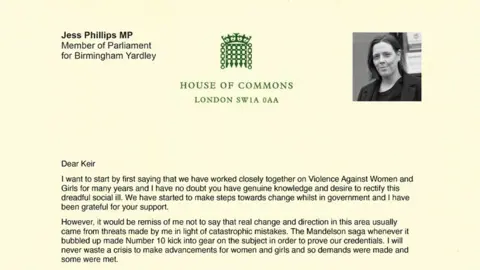 A letter from Jess Phillips to Keir Starmer reading: Dear Keir I want to start by first saying that we have worked closely together on Violence Against Women and Girls for many years and I have no doubt you have genuine knowledge and desire to rectify this dreadful social ill. We have started to make steps towards change whilst in government and I have been grateful for your support. However, it would be remiss of me not to say that real change and direction in this area usually came from threats made by me in light of catastrophic mistakes. The Mandelson saga whenever it bubbled up made Number 10 kick into gear on the subject in order to prove our credentials. I will never waste a crisis to make advancements for women and girls and so demands were made and some were met. I think you are a good man fundamentally, who cares about the right things however I have seen first-hand how that is not enough. The desire not to have an argument means we rarely make an argument, leaving opportunities for progress stalled and delayed. Over a year ago I presented solutions, long worked on by brilliant civil servants that would end the ability for children in the UK to take naked images of themselves. 91% of online child sex abuse is self-generated by children groomed, tricked and exploited in to abuse. The technology exists to stop children being able to take naked images of themselves. We could make this possible on every phone and device in the country. We could stop this abuse. It has taken me a year to get you to agree to even threaten to legislate in this space. Not legislate, just threaten. This is the definition of incremental change. Nothing bold about it. The announcement was meant to be in March, I'm still on a promise this will happen in June, I've given up believing it. How many children were left without a safety net in the time we dilly dallied and worried about tech bosses? This is just one example. Labour governments come around rarely is the constant refrain at the moment. It's true they are precious. Every Labour government in my and my family's lifetime has forged progress that changed our country and the world for the better. I know you care deeply, but deeds, not words are what matter. I'm not sure we are grasping this rare opportunity with the gusto that's needed and I cannot keep waiting around for a crisis to push for faster progress. Decency is vital, calm curiosity is also needed, but so too are fight and drive required. Have a row, push back, make arguments, bring people along. Standing up and being counted can't always be workshopped. Politics is as much about feelings as policy, especially at the moment. I want a Labour government to work and I will strive as I always have for its success and popularity, but I'm not seeing the change I think I, and the country expect, and so cannot continue to serve as a minister under the current leadership. Best wishes Jess Phillips MP 