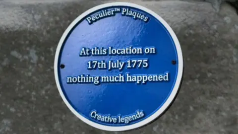 Josie Beszant Blue plaque on stone wall stating at this location on the 17th of July 1775 nothing much happened.