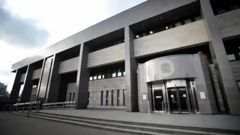 PA Media A general view of Glasgow Sheriff Court