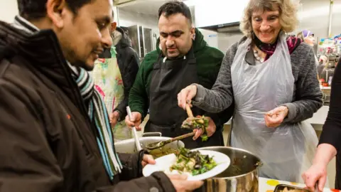 Borderlands People hand out food at Borderlands' drop-in centre