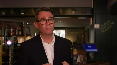 Andy Burnham being interviewed in a pub in Harlow 
