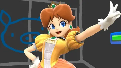 Nintendo Princess Daisy in a Smash Bros screenshot. She's wearing a yellow dress with puffy shoulders. One white-gloved hand rests on her hip, her other hand is held out to her side at a 45-degree angle, doing a "peace" sign with her index and middle finger extended, palm forward. She's got white flower earrings with a large, round emerald in the centre of each. Her long red hair cascades down her shoulders and she wears a gold crown with the same white flower decoration as seen on her jewellery. Her big blue eyes are open wide as she smiles, looking victorious. She's in a room with dark grey walls and what looks like a light grey crayon outline of walls and a door on it. There's also a large, rudimentary drawing, in blue, of a pig's face on the wall.