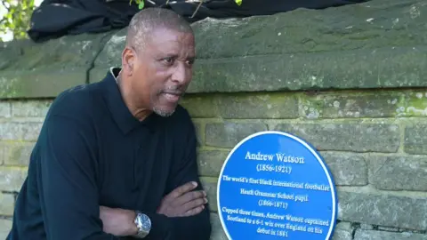 England's first black international, Viv Anderson, unveiling a blue plaque for Andrew Watson in Halifax