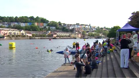 BBC Swimmers and crowds at Bristol Harbour