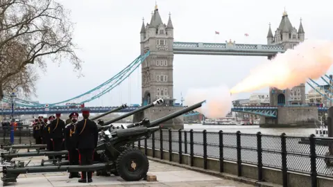 Getty Images The Honourable Artillery Company fire a gun salute at The Tower of London on April 10, 2021 in London