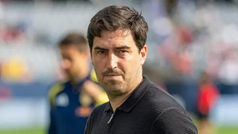 Liverpool manager Andoni Iraola looks on during a training session