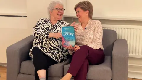 Hopscotch Janey Godley with former First Minister Nicola Sturgeon, who she spoofs in Covid briefing videos
