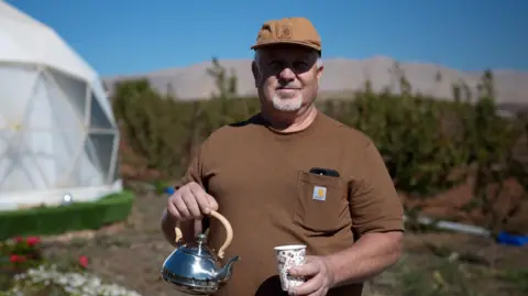 Farhat, a Syrian who owns an eco-lodge in the Israeli-occupied Golan Heights