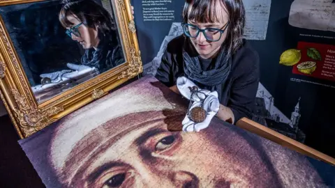 Charlotte Graham Dr Hannah Thomas with a portrait of Mary Ward and her 17th Century Paternoster bead