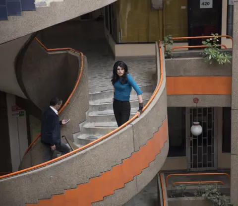 Carolina F. Del Dago Katherine poses on the stairs in the Galax Mall