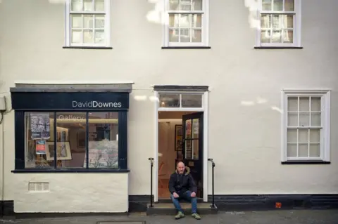 Laurence Cawley/BBC David outside his gallery