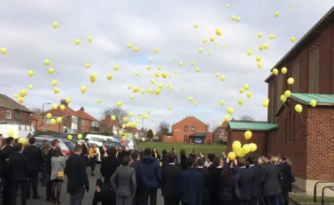 Balloons being released after Charlie Pope's funeral