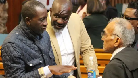 Werner Menges/The Namibian Ex-Justice minister Sakeus Shangala, and former director of state fishing company Fishcor, James Hatuikulipi