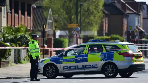PA A police officer and police car at the shut Marsh Road