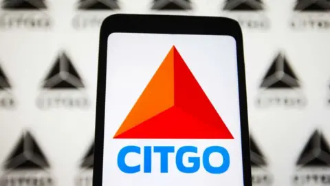 Getty Images In this photo illustration, Citgo Petroleum Corporation logo is seen displayed on a smartphone screen.