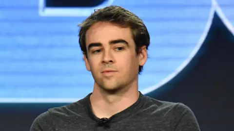 Getty Images Tyler Schultz in close-up on a stage